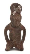 A PreColumbian Male Pottery Figure Colima