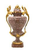 A Neoclassical Gilt Bronze Mounted Marble Urn