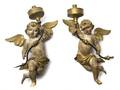 A Pair of Painted and Parcel Gilt Figural Sconces