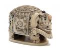 A Japanese Inlaid Ivory Elephant Form Netsuke