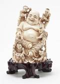 A Chinese Carved Ivory Figural Group