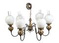 A Pair of Brass EightLight Chandeliers
