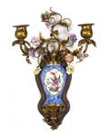 A French Gilt Metal and Porcelain Sconce