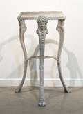 An Iron and Marble Side Table