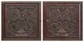 A Pair of Continental Carved Oak Plaques
