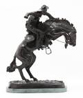 An American Bronze Figural Group after Frederic Remington