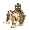 A Southeast Asian Jeweled And Yellow Gold Mounted Ivory Elephant