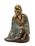 A Cloisonne and Bronze Model of a Buddhist Disciple