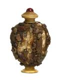 A Chinese Ivory and Carved Hardstone and Soapstone Snuff Bottle