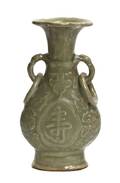 A Celadon Glazed Molded Vase