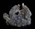 A Chinese Carved Chalcedony Model of Dragons