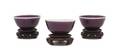 A Group of Three Sang de Boeuf Glazed Bowls