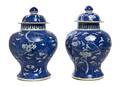 A Pair of Chinese Lidded Porcelain Vases