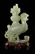 A Carved Jade Phoenix with Vase