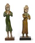 A Group of Two Tang Dynasty Style Figures of Foreign Grooms