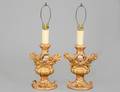PAIR OF CARVED PAINTED AND GILTWOOD CANDLE HOLDERS