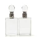 A Pair of English Silver Mounted Glass Decanters