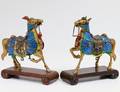 PAIR OF BRASS AND ENAMEL HORSES