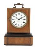 A Late Victorian Ebonized Walnut and Brass Mounted Mantel Clock