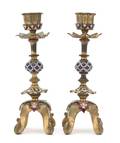 A Pair of Gilt Metal and Champleve Candlesticks
