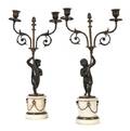A Pair of Continental Bronze and Marble TwoLight Figural Candelabra