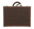 A Louis Vuitton Monogram Canvas Hardsided Suitcase