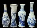 GROUP OF FOUR MING BLUE AND WHITE PORCELAIN BUD VASES