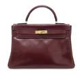 An Hermes Burgundy Leather Kelly