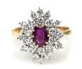 An 18 Karat Gold Ruby and Diamond Ring