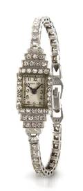 A 14 Karat White Gold and Diamond Wristwatch Hamilton