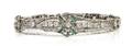 A 14 Karat White Gold Diamond and Emerald Bracelet