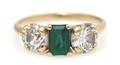 A 14 Karat Yellow Gold Emerald and Diamond Ring