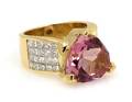An 18 Karat Yellow Gold Pink Tourmaline and Diamond Ring