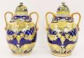Pair of Two Deruta Style Ceramic Lidded Urns