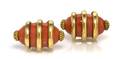A Pair of 18 Karat Yellow Gold and Coral Cufflinks French