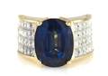 An 18 Karat Yellow Gold Sapphire and Diamond Ring
