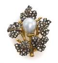 An Silver Topped Gold Diamond and Cultured Pearl Brooch Buccellati