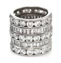 A Group of 14 Karat White Gold Eternity Bands