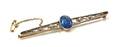 An Edwardian Platinum Topped Yellow Gold Black Opal and Diamond Bar Pin Hardy Brothers