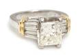 A Platinum 18 Karat Yellow Gold and Diamond Ring