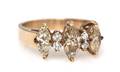 A 14 Karat Yellow Gold and Diamond Ring