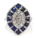 A 14 Karat White Gold Sapphire and Diamond Ring