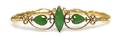A 14 Karat Yellow Gold and Jade Bracelet