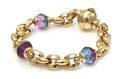 A 14 Karat Yellow Gold and Faux Gemstone Bracelet Faro