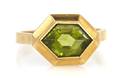 A 14 Karat Yellow Gold and Peridot Ring