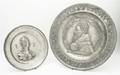 Two Continental Pewter Relief Chargers