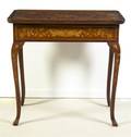 A Continental Marquetry and MotherofPearl Inlaid Table