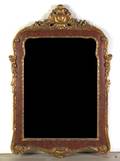 A Painted and Parcel Giltwood Mirror
