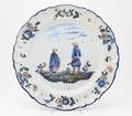 A Keller and Guerin French Faience Charger