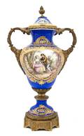 A Sevres Style Gilt Bronze Mounted Urn
